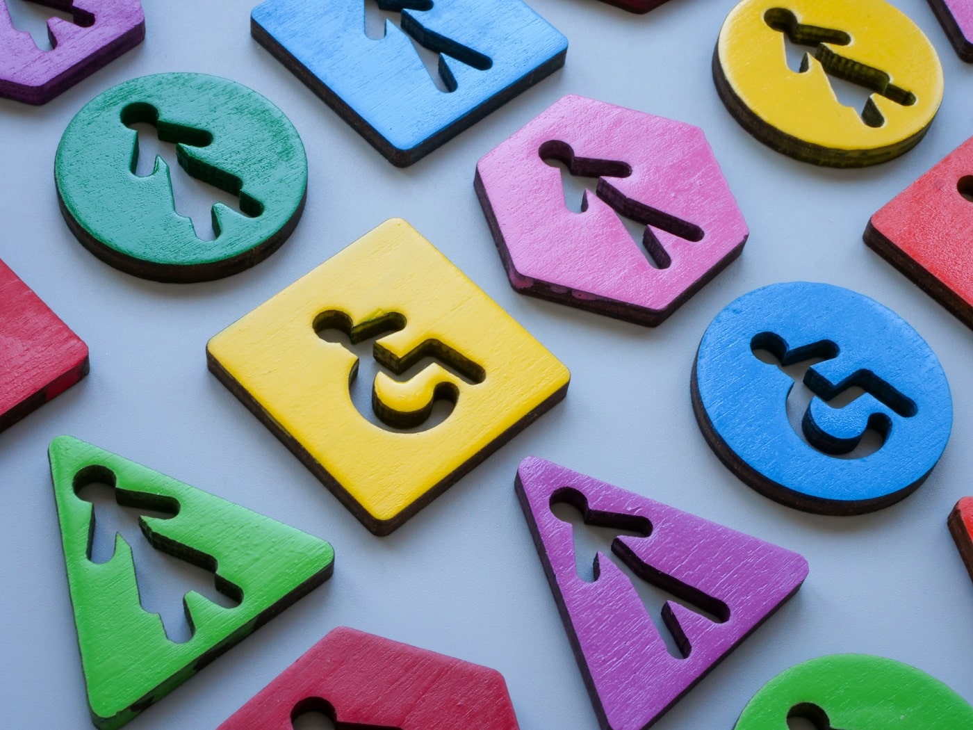 Inclusive, colorful signs grouped together, showcasing diversity, accessibility, and shared community values.